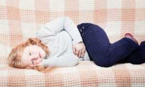 Боли в животе, понос и высокая температура: возможные причины и лечение