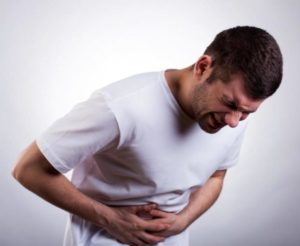 сильные боли в области живота